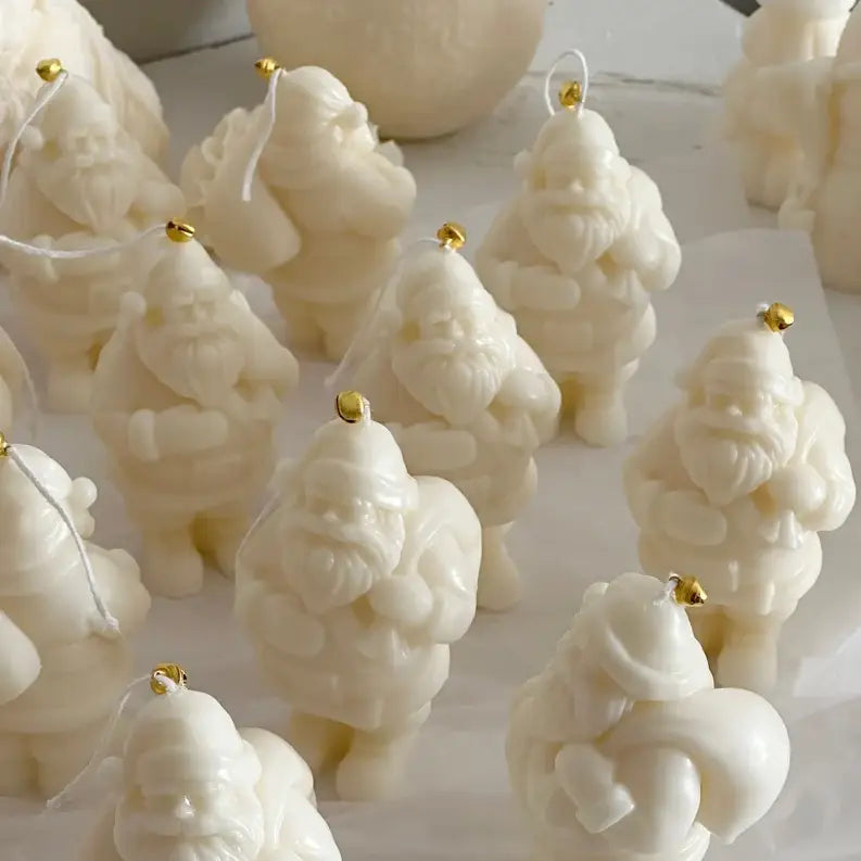 PETITE BOUGIE PERE NOEL BOIS DE SANTAL ET AMBRE