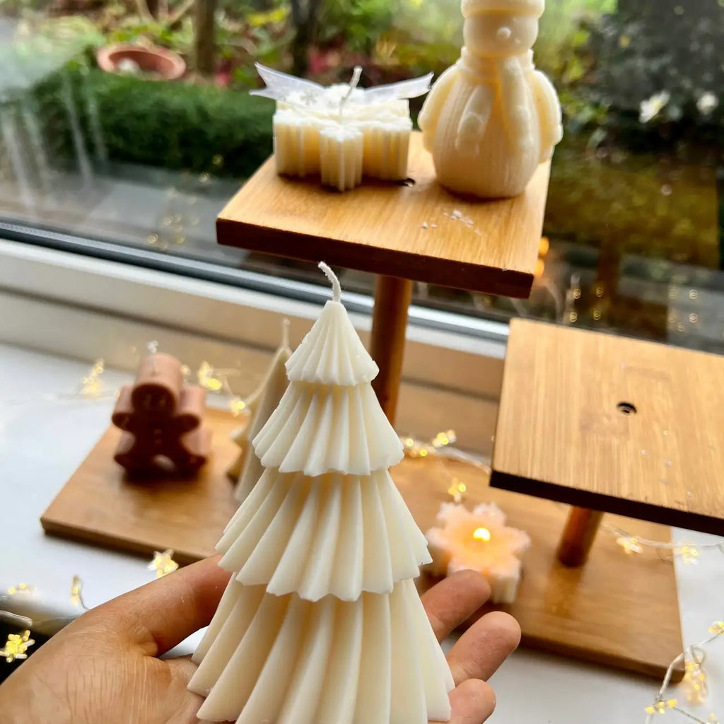 BOUGIE RAYURES ORIGAMI CREME BOIS DE SANTAL ET AMBRE